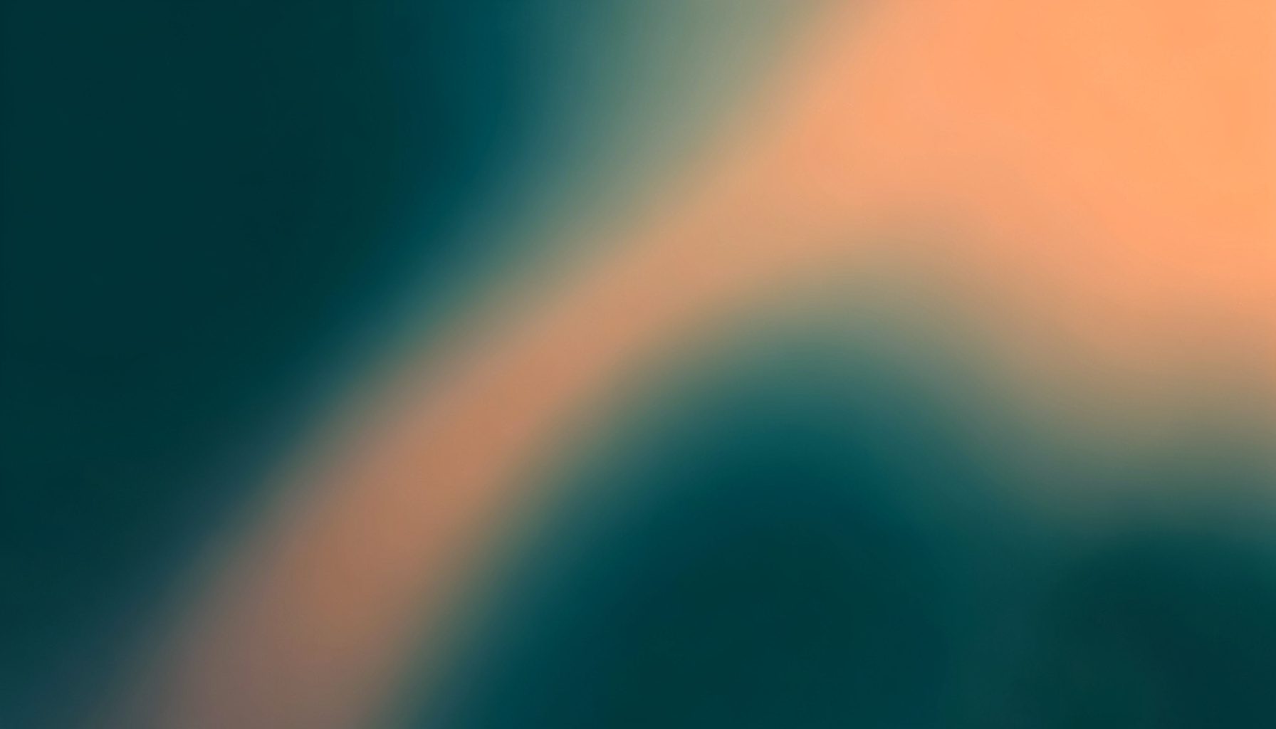 Abstract gradient blend of deep teal and soft orange evoking a thoughtful evening studio mood.